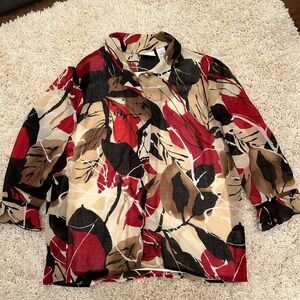 Alfred Dunner size 14 women’s blouse with three-quarter length ruffled sleeves.